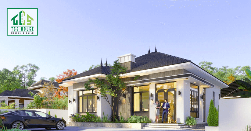 Mẫu 1: Nhà mái Nhật hiện đại với hệ mái màu xám tro, tường sơn trắng và cửa kính lớn, tạo không gian mở và đón ánh sáng tự nhiên.