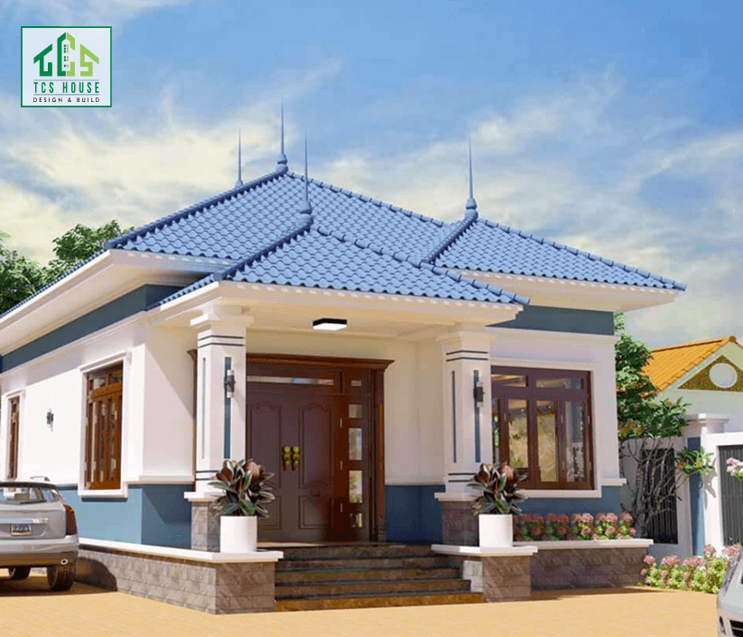 Mẫu 5: Mái Nhật màu xanh đen kết hợp cột trụ lớn và cửa sổ vòm, mang lại sự sang trọng và bề thế.
